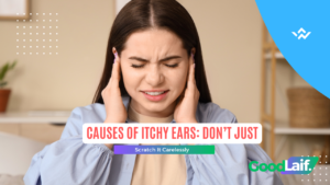 Person experiencing itchy ears and touching the ear due to discomfort