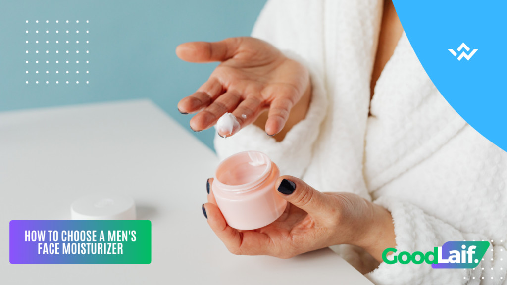 Hands scooping men’s face moisturizer from a cream jar 