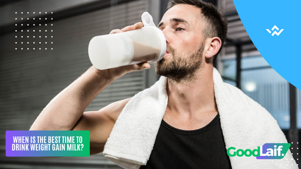 Man drinking weight gain milk after workout with towel on shoulders
