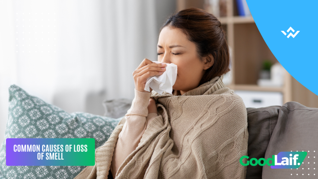 A woman holding a tissue to her nose due to Loss of Smell