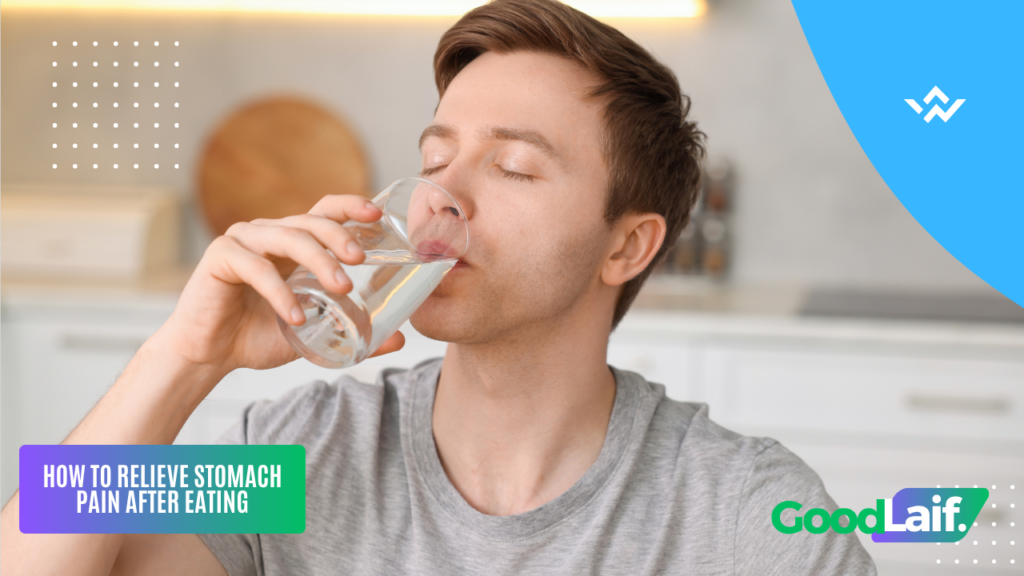 Person drinking water to treat stomach pain after eating