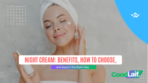 Woman taking care of facial skin with night cream after shower