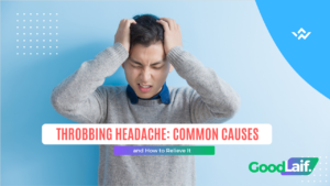 Man holding his head with both hands due to a throbbing headache