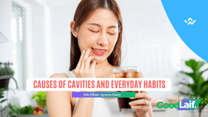 Woman holding her cheek in pain due to the causes of cavities and habit of eating sugary foods